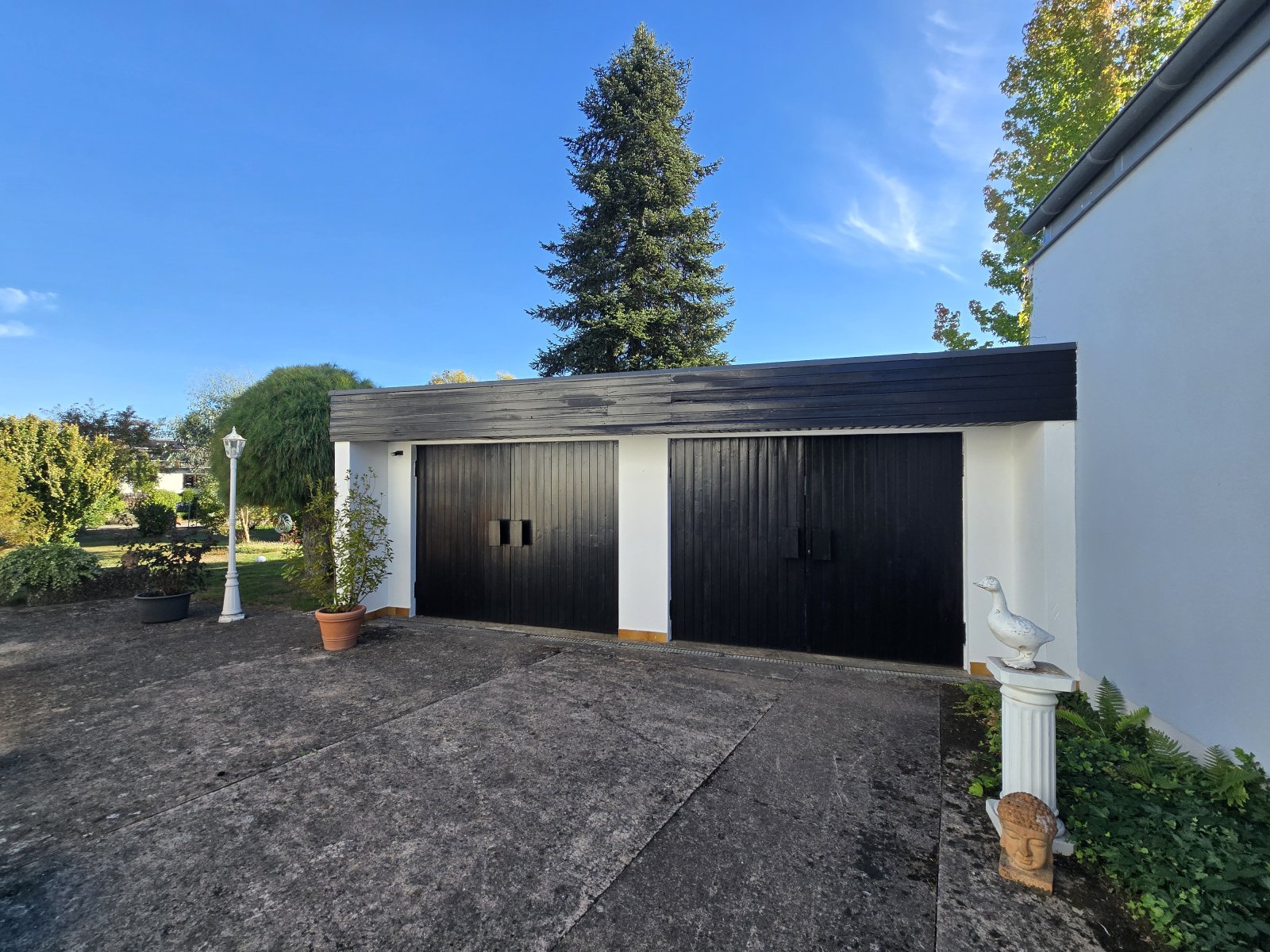 Sonnige Auszeiten inklusive – Ihr Zuhause mit zwei Terrassen und Garten